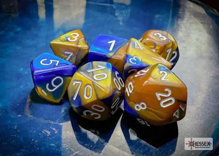 RPG Dice Set: Gemini Polyhedral Blue Gold/White (7) Chessex Accessories